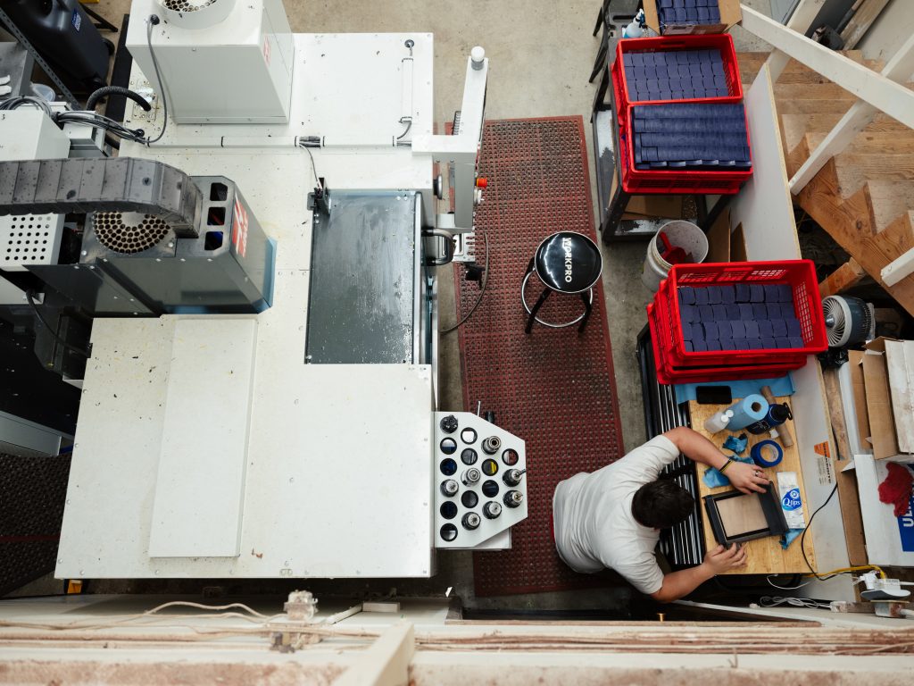 Manning the HAAS mini-mill.